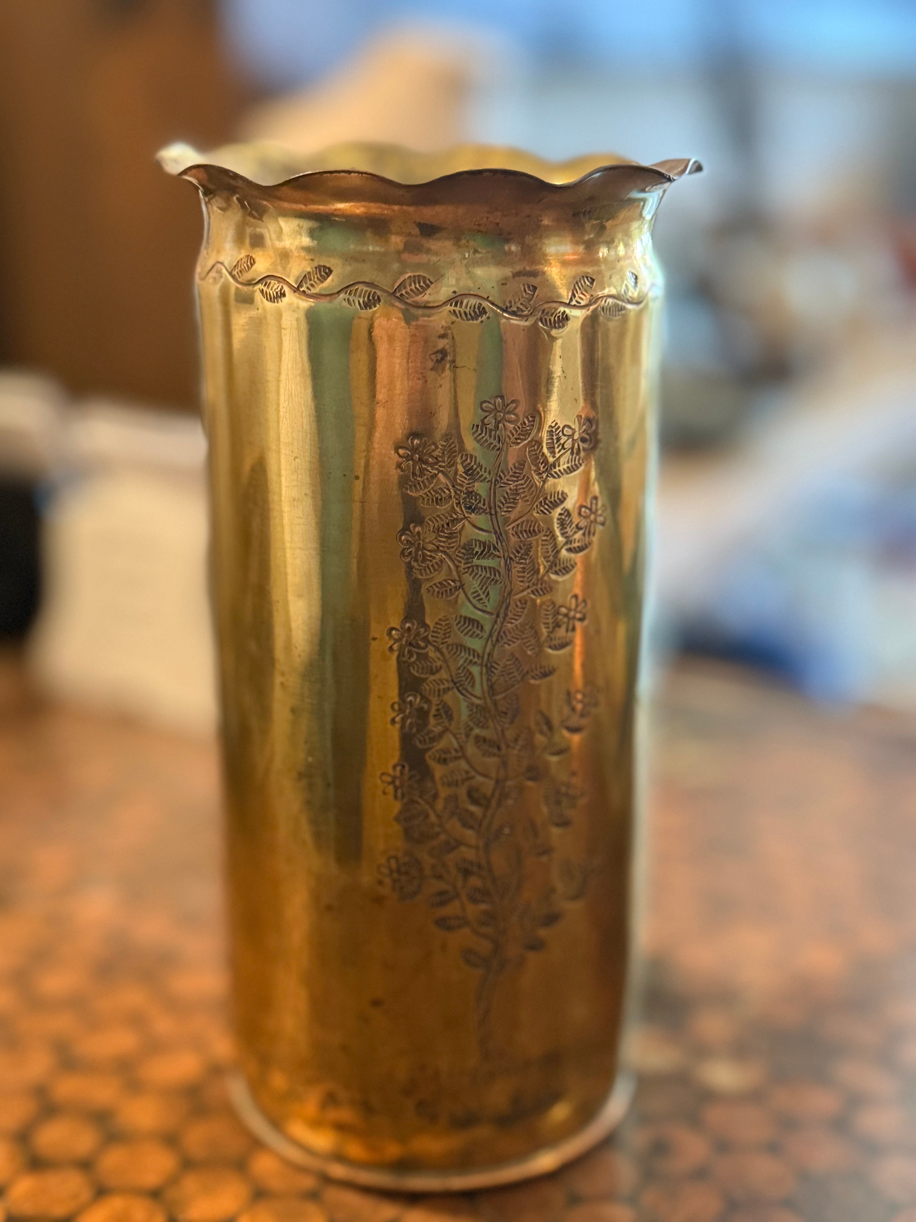 Brass vase with tree engraving